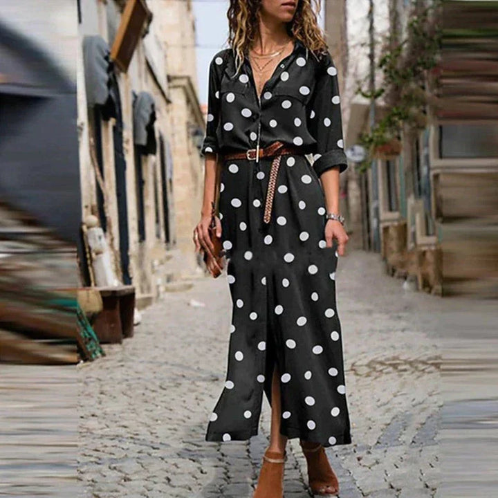 Flowy polka dot maxi shirt dress for women. Stylish long sleeve, button-down design, perfect for casual or elegant wear.