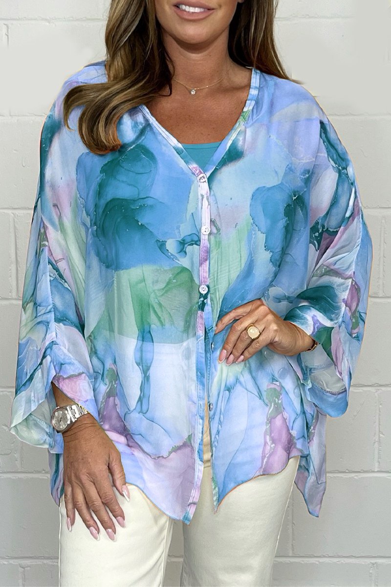 Stylish women's printed shirt, elegant design. A perfect versatile top for everyday fashion.