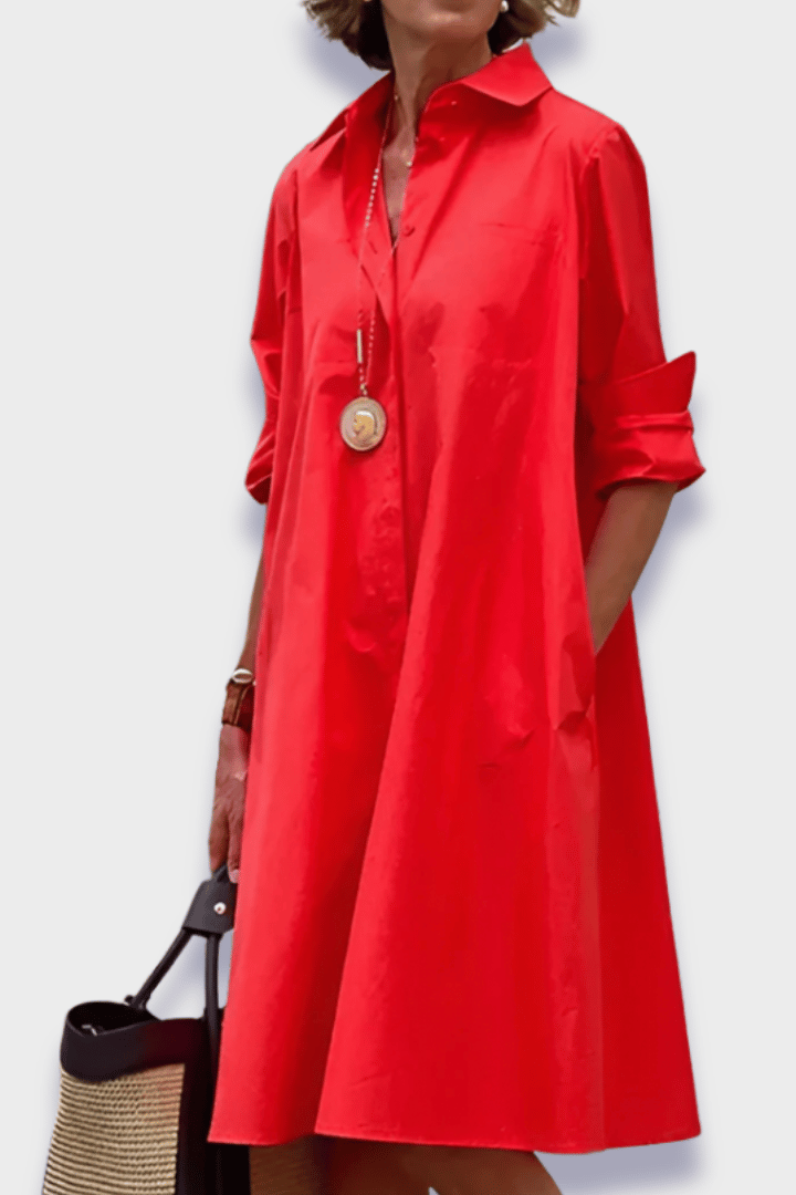Women's elegant printed floral midi dress, perfect for summer occasions, featuring a flattering waist-defined silhouette.