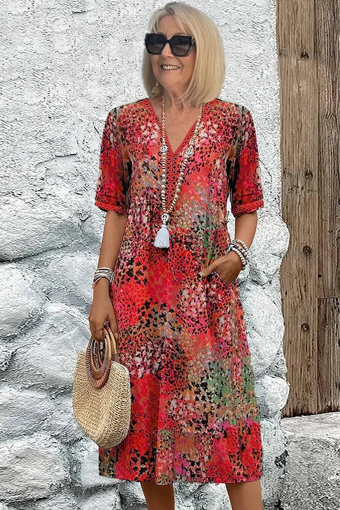 Floral printed women's midi dress. Versatile and elegant, suitable for casual or party wear this spring.