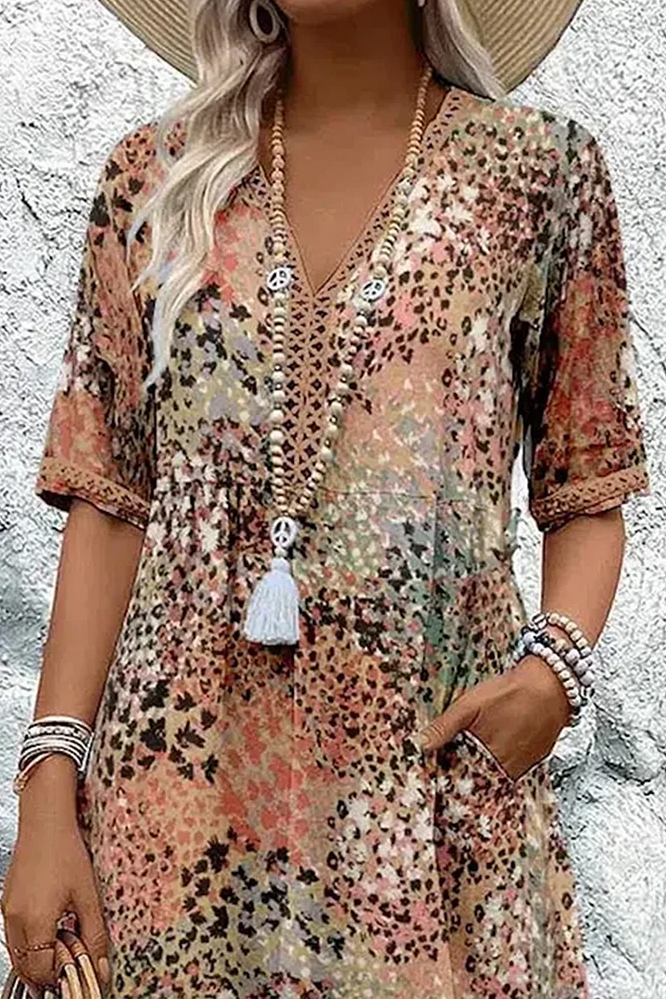 Beautifully printed women's elegant midi dress; a comfortable, flowing spring dress with a flattering silhouette.