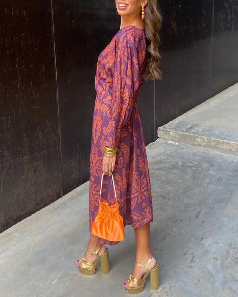 Beautiful women's printed v-neck long sleeve dress, a graceful option for wedding guests & events.