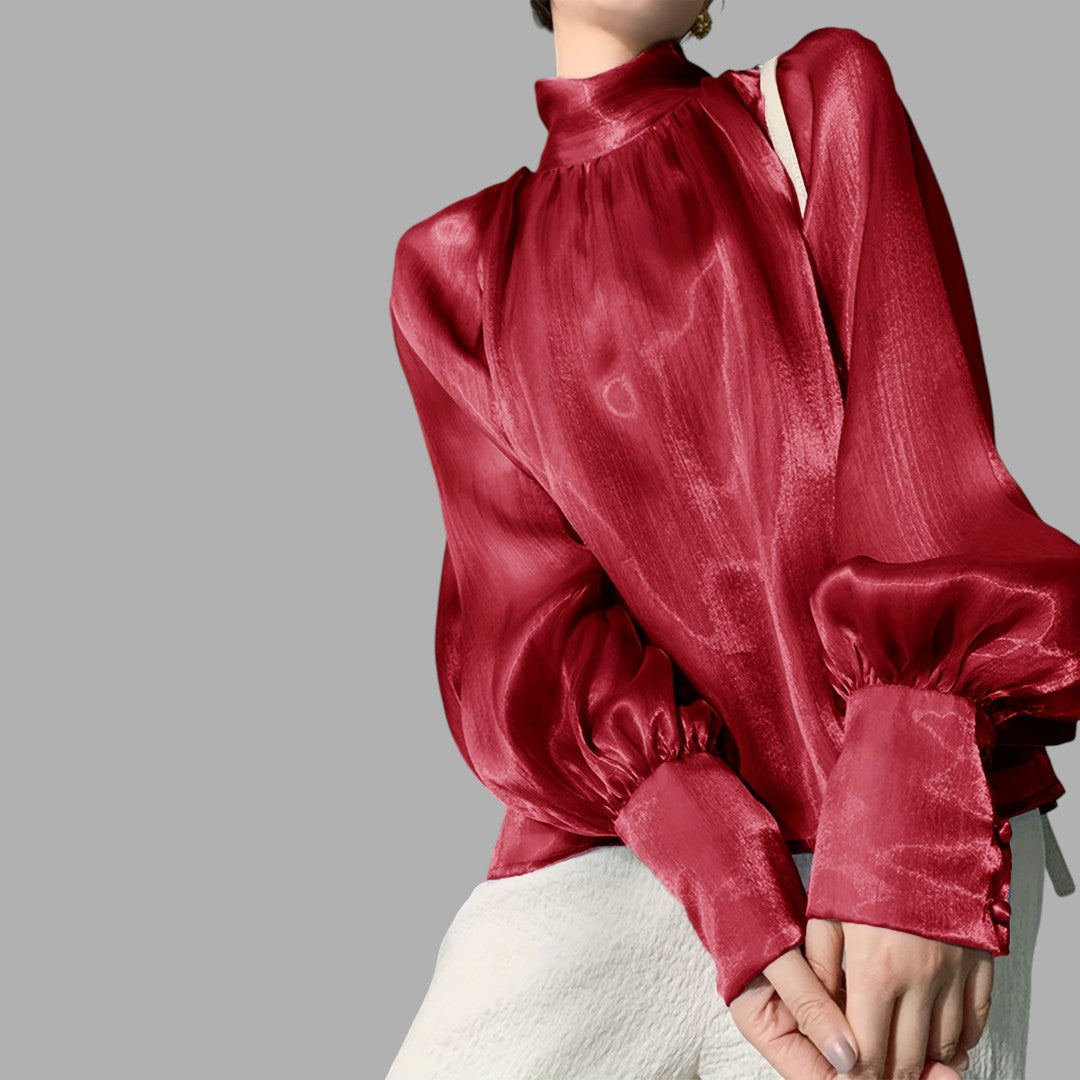 Elegant women's puff sleeve top, a fashionable and comfortable blouse for any occasion.