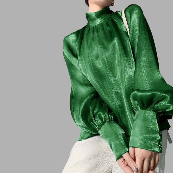 Chic women's workwear blouse with elegant puff sleeves, a sophisticated and versatile fashion top.