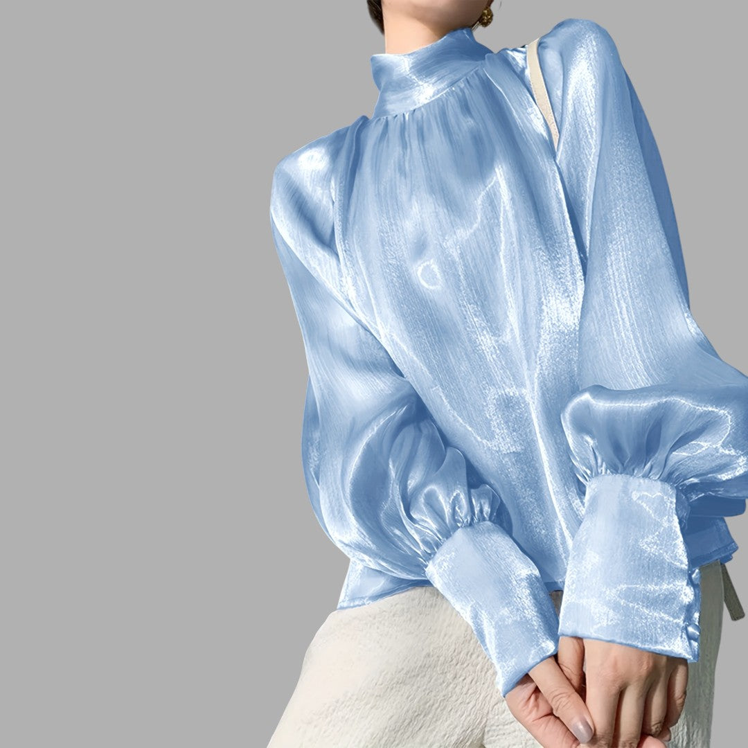Stylish elegant women's blouse, featuring delicate puff sleeves for a feminine and fashionable look.