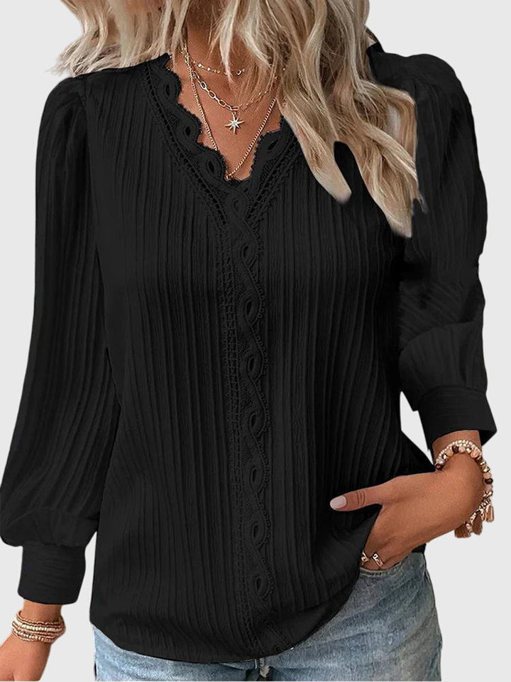 Versatile women's elegant top, this pullover blouse is perfect for office attire or sophisticated everyday wear.