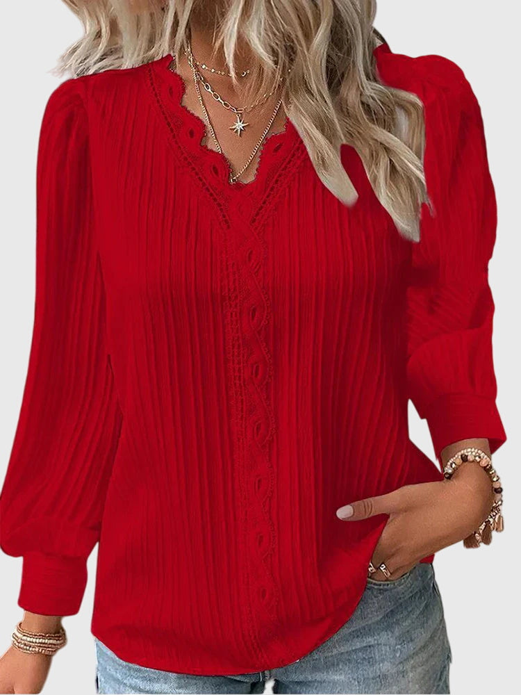 Stylish women's pullover blouse, perfect for office attire or casual chic, offering everyday elegance and comfort.