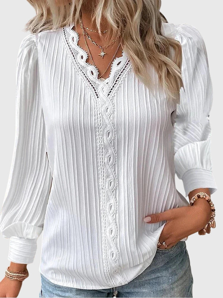 Women's elegant long sleeve pullover blouse, a versatile and comfortable top for sophisticated casual & office wear.