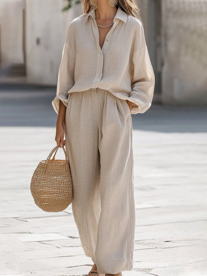 Stylish women's two-piece summer outfit with a loose fit blouse & matching pants.