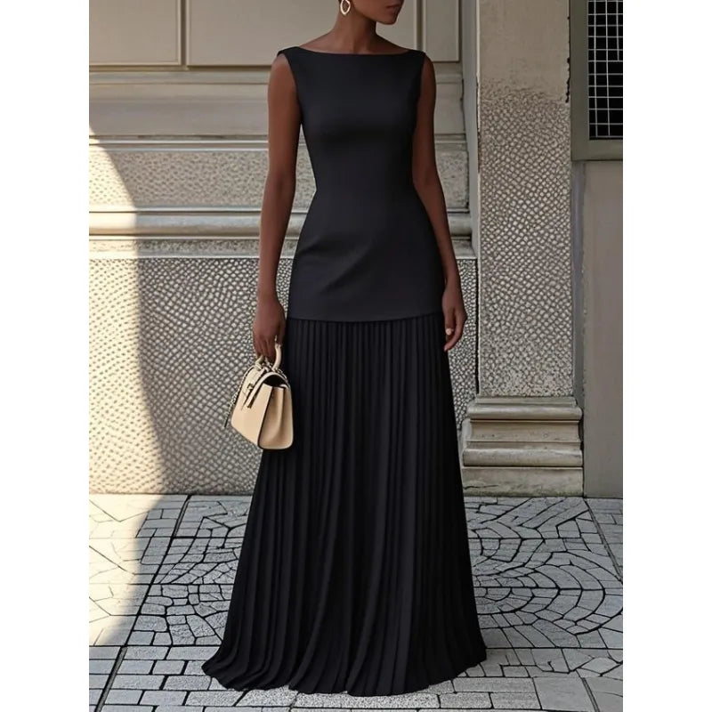 Flowy boat neck maxi dress for women, ideal for summer evenings or sophisticated formal wear.