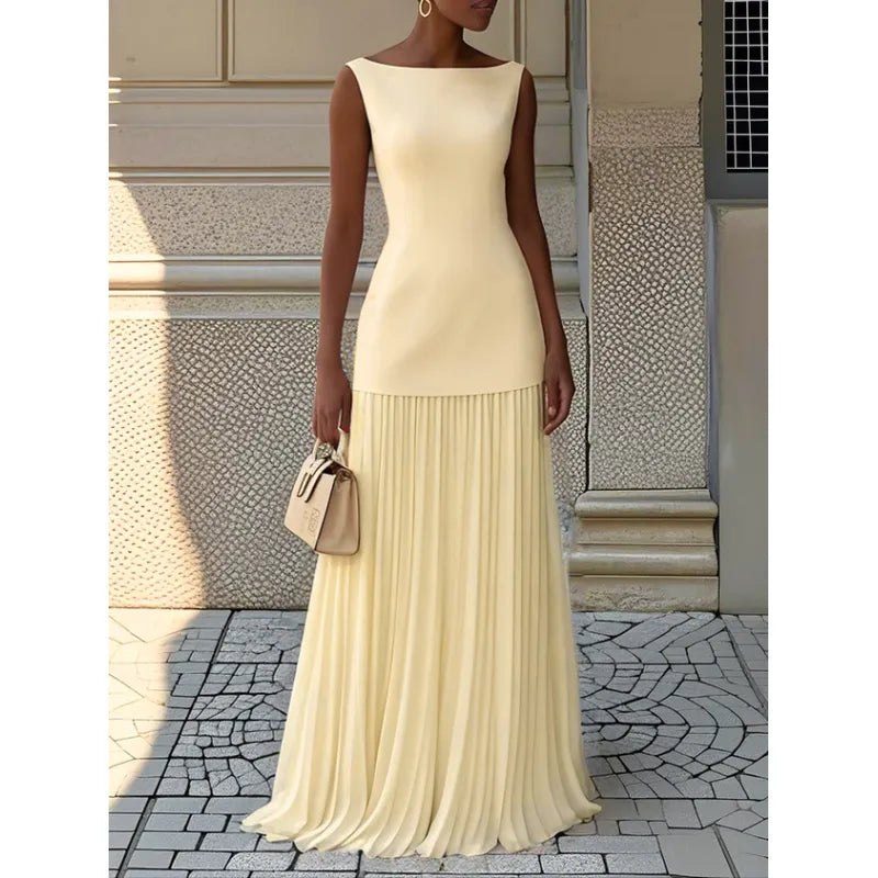 Elegant women's sleeveless maxi dress with boat neck and pleats, perfect for evening wear or formal events.