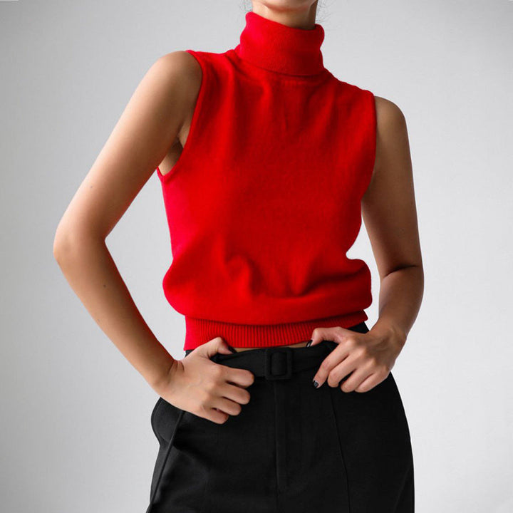 Chic women's sleeveless mock neck knit top, ideal for layering and casual elegant style.