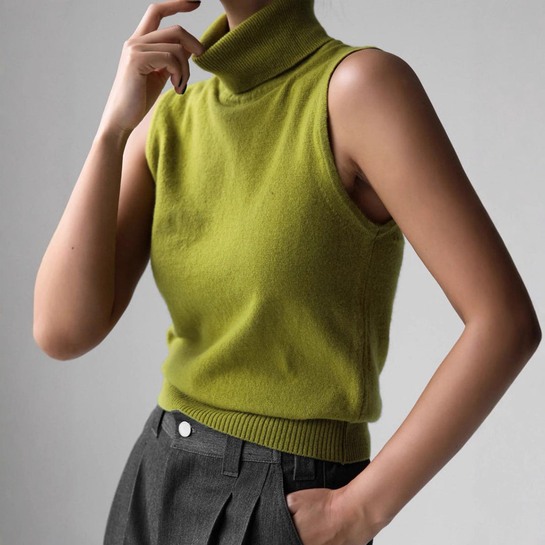 Versatile women's sleeveless mock neck top, a knit essential for modern and elegant fashion.