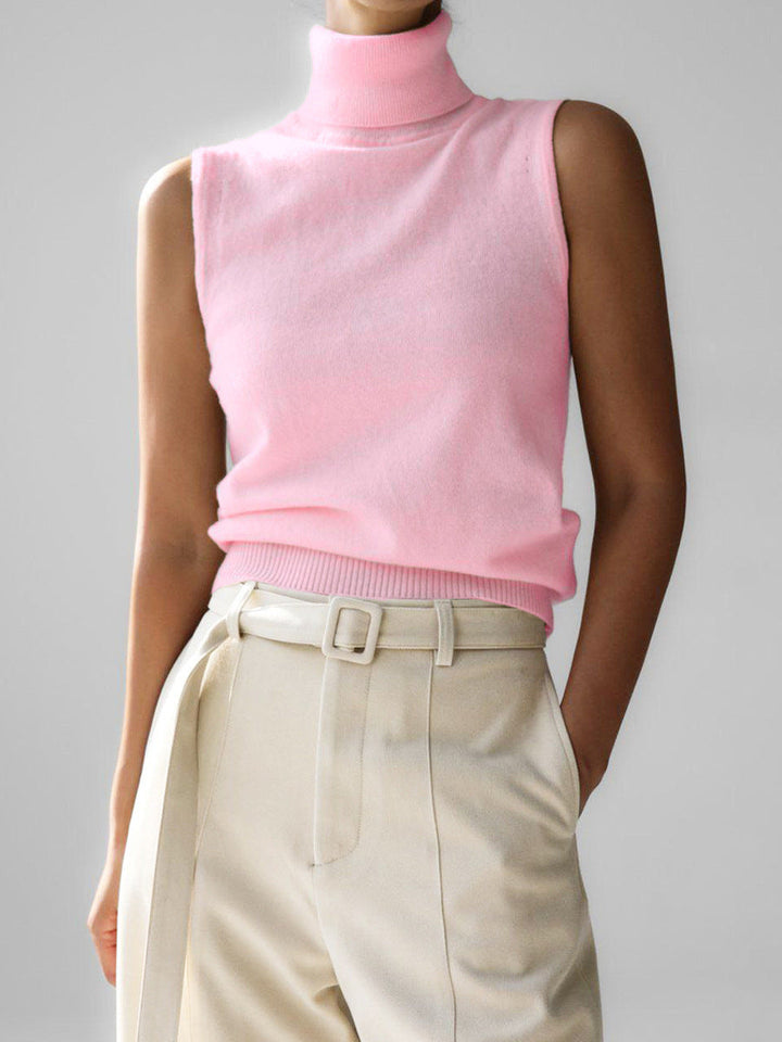 Elegant women's sleeveless mock neck knit top. A versatile slim fit essential for a chic wardrobe.