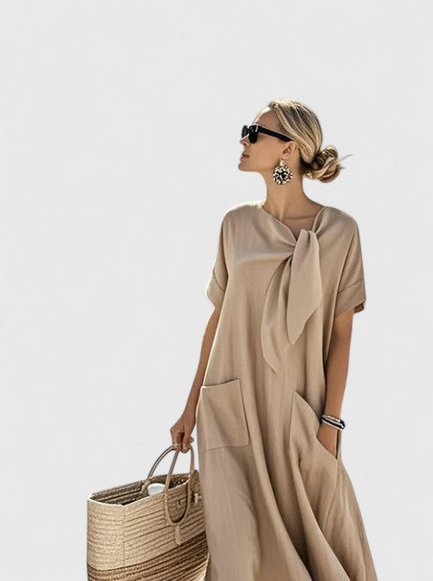 Chic women's elegant midi summer dress, perfect for casual day or sophisticated evening wear. Effortless style.