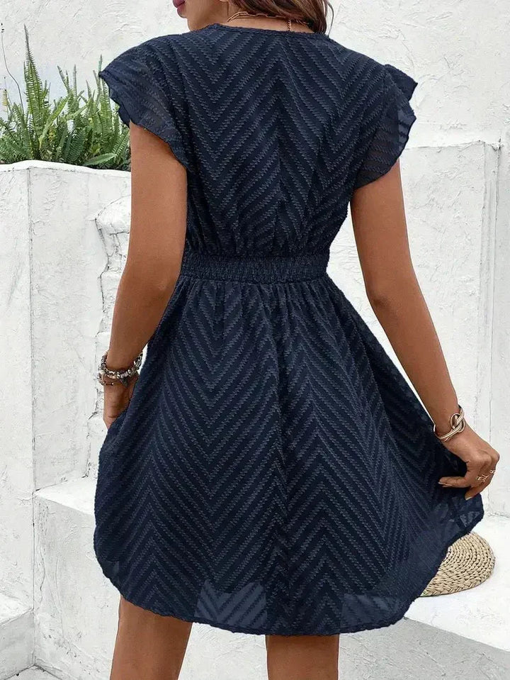 Elegant women's apricot sweetheart dress. Perfect for summer events, offering comfort and feminine style.