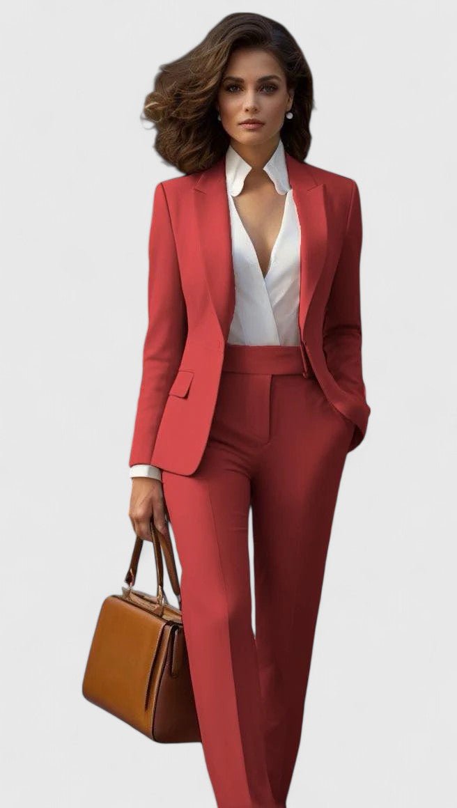 Women's elegant tailored suit: lapel blazer & straight leg pants. Professional business attire for events.