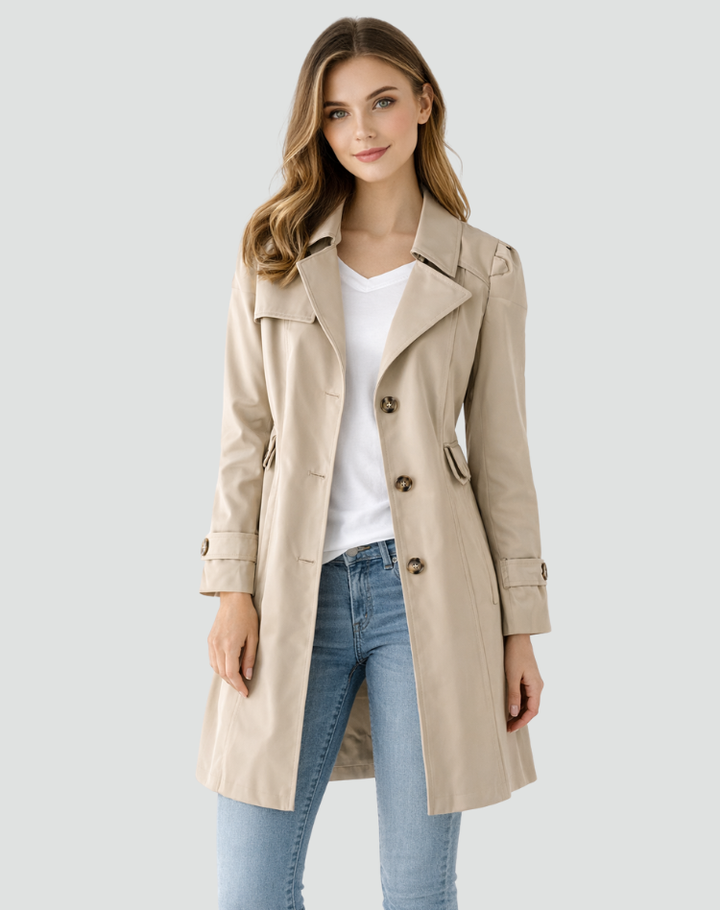 Versatile women's classic trench coat with button front. Ideal elegant outerwear for fall and spring fashion.