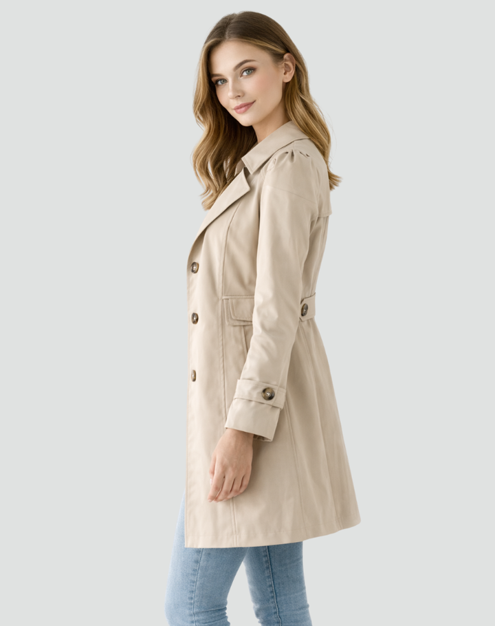 Timeless women's tailored trench coat, elegant and classic. Durable outerwear for spring, fall, & formal occasions.