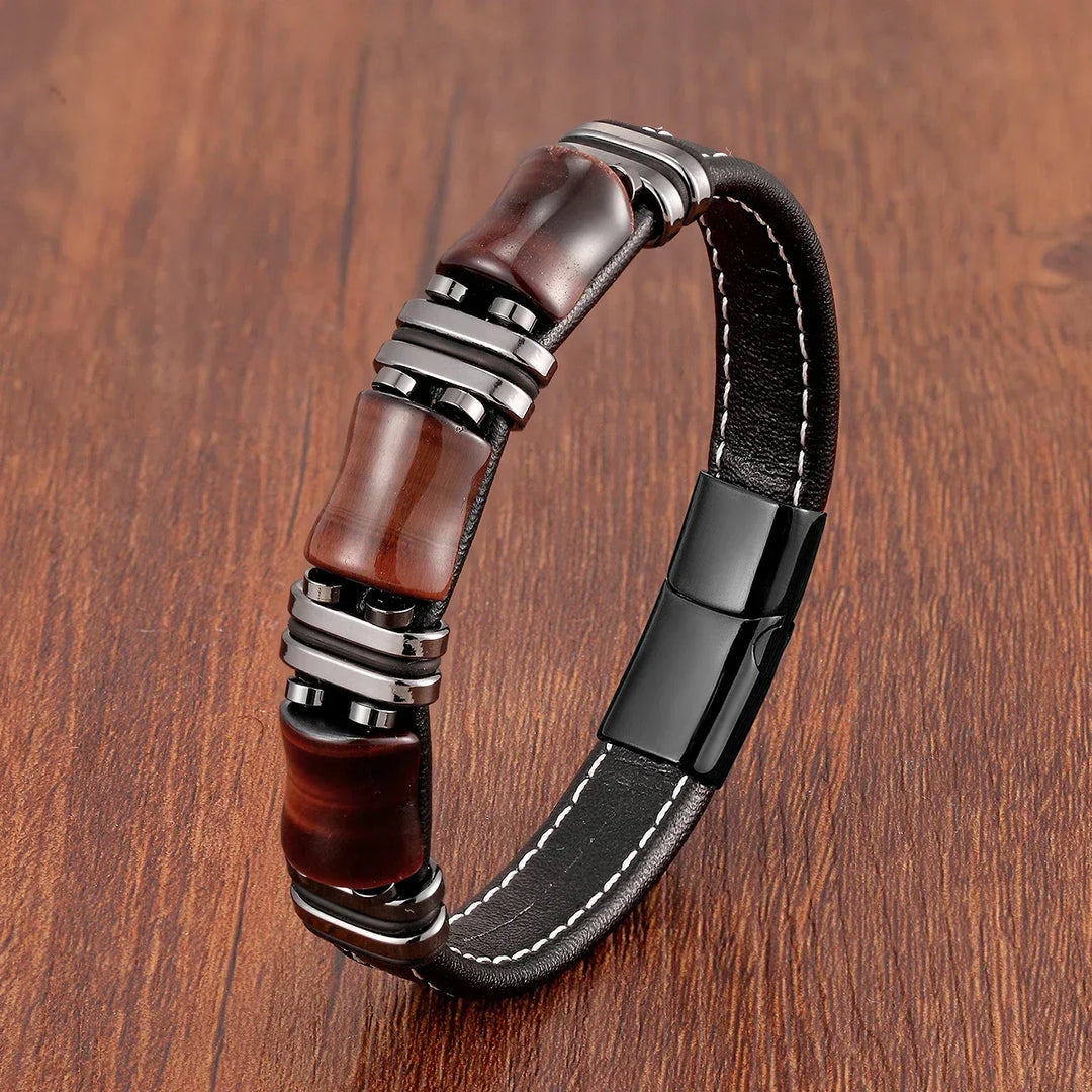 Close-up of a women's Tiger's Eye stone bracelet, featuring rich brown & gold hues. Elegant fashion accessory.