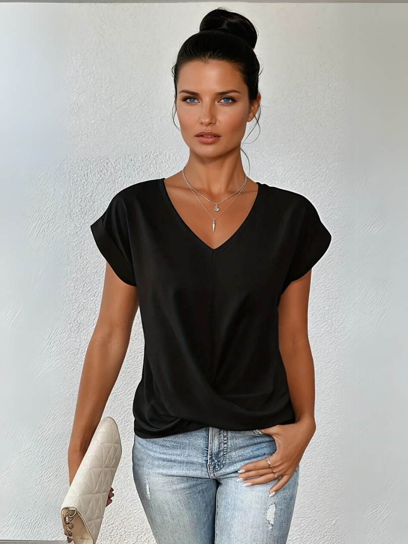 Women's elegant twist-front V-neck short sleeve top. Polished style for office or casual wear.