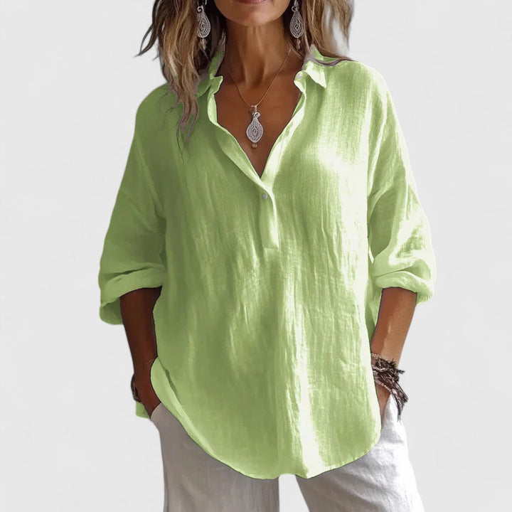 Comfortable women's flowy V-neck blouse. Stylish long sleeve top for spring, summer, office, or casual wear.