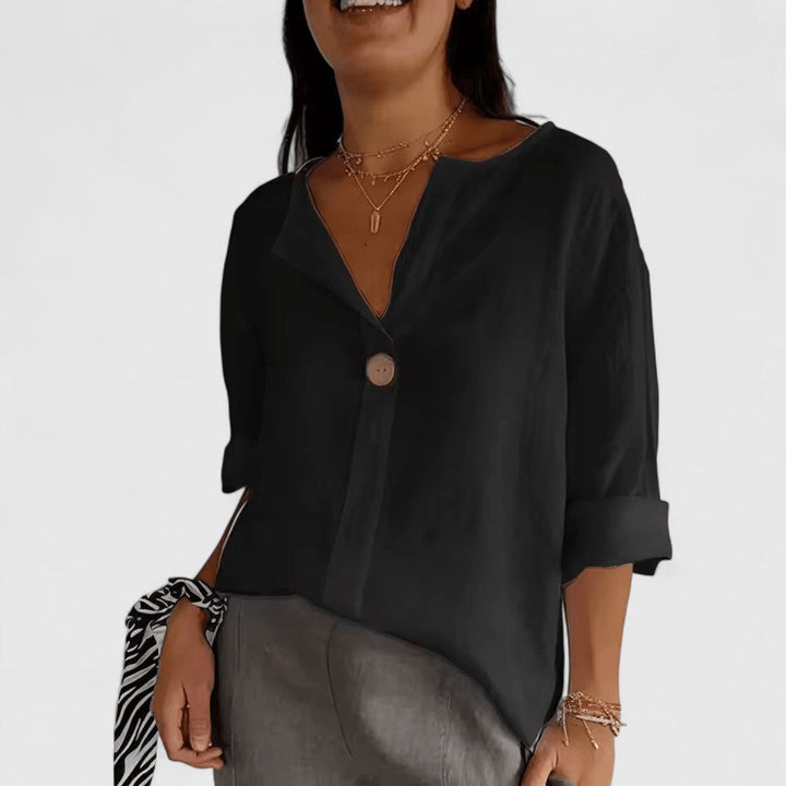 Women's elegant V-neck blouse with front knot detail. Perfect for chic summer and everyday wear.