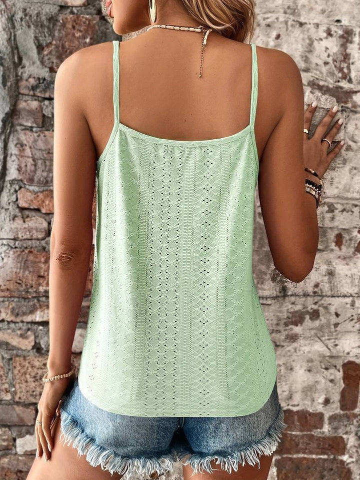 Designed for summer, this women's V-neck cami top boasts graceful lace trim and a relaxed fit.