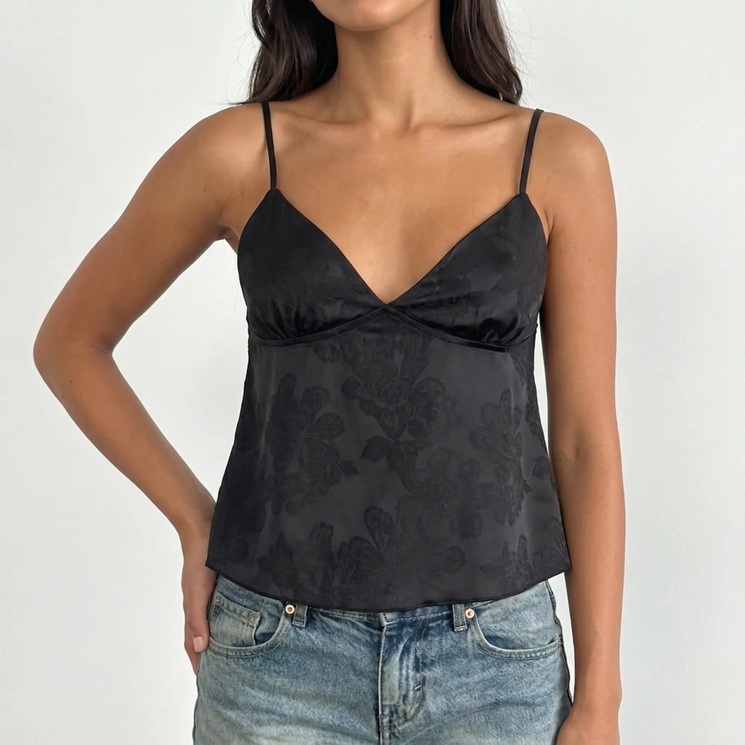 Stylish women's V-neck floral jacquard cami with spaghetti straps, ideal for elegant summer fashion.