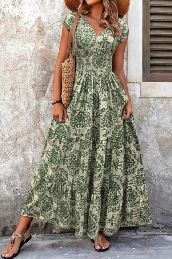 Printed floral V-neck maxi dress for women, elegant summer fashion with a relaxed, flowy fit. Ideal for vacation.
