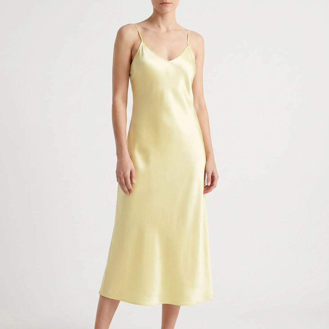 Versatile women's V-neck midi slip dress, suitable for elegant summer casual or formal events.