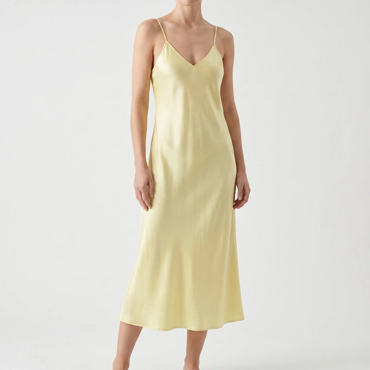 Elegant women's V-neck midi slip dress, a versatile piece for summer, casual, or formal styling.