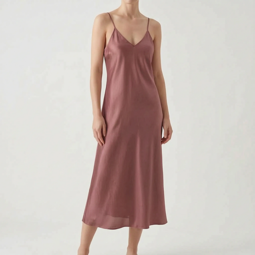 Luxurious women's elegant V-neck midi slip dress, ideal for sophisticated summer events.