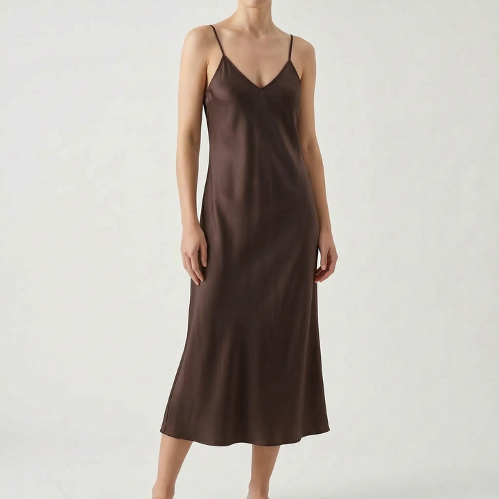 Women's V-neck midi slip dress with spaghetti straps, easily dressed up or down for summer.
