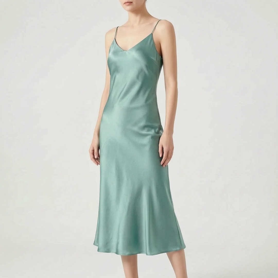 Modern women's slip midi dress with V-neck, an elegant and sophisticated sleeveless design perfect for any party.