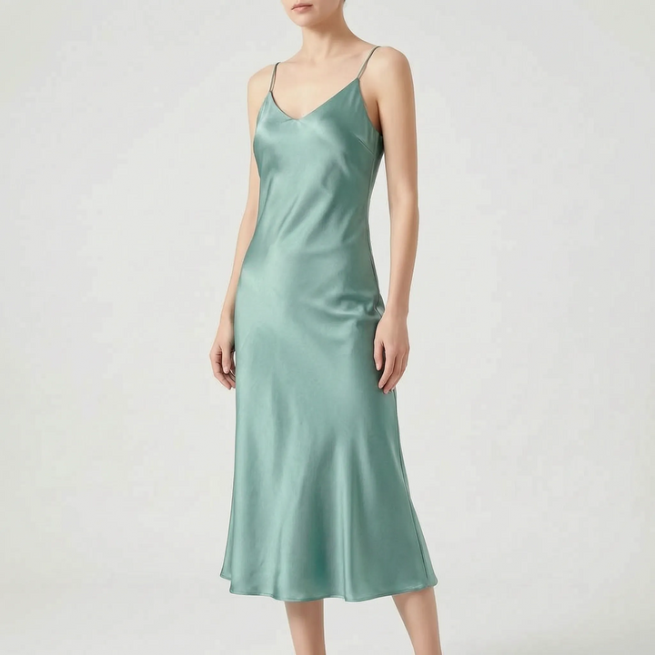 Modern women's slip midi dress with V-neck, an elegant and sophisticated sleeveless design perfect for any party.
