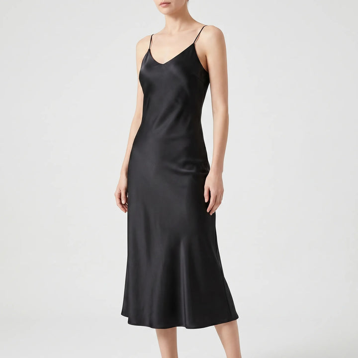 Elegant women's V-neck sleeveless midi dress, a versatile slip style for sophisticated cocktail, evening, or party wear.