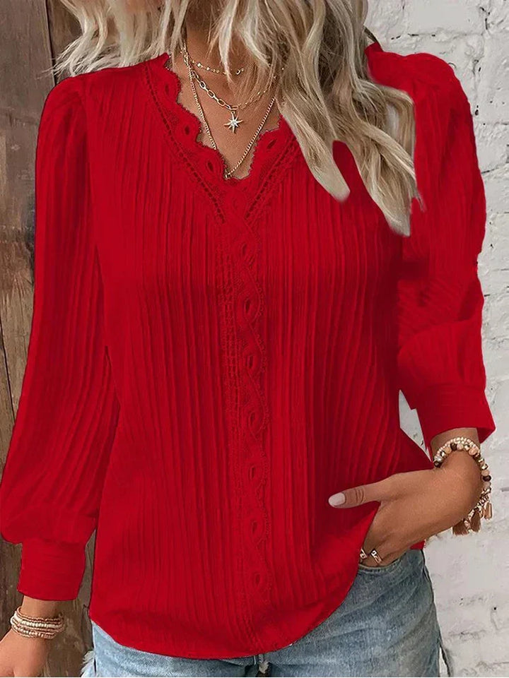 Light & airy chiffon-style lace blouse for women. Perfect summer fashion top with puff sleeves.