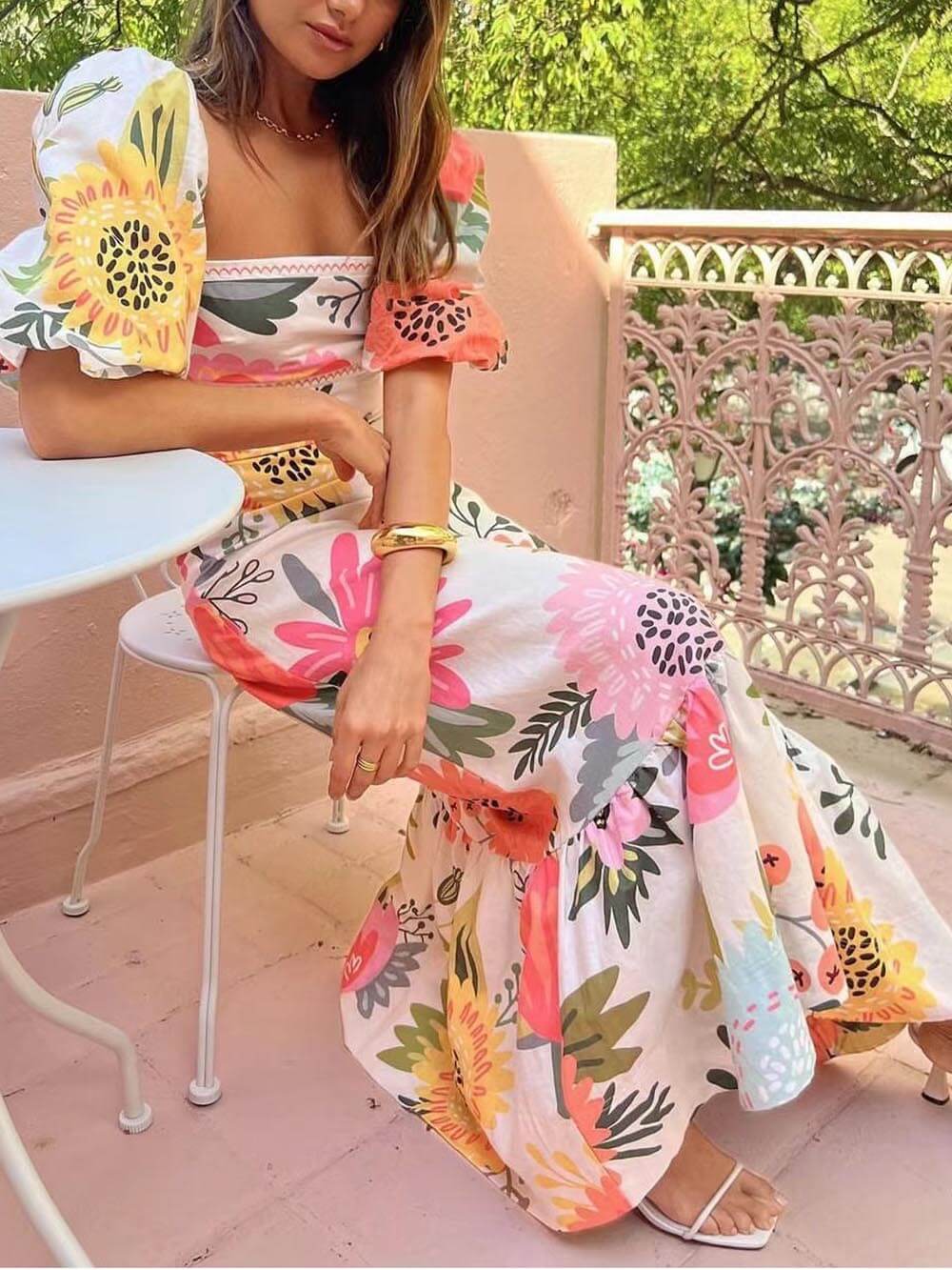 Elegant white long maxi dress for women, detailed with stylish puff sleeves & a chic square neck. Summer fashion.