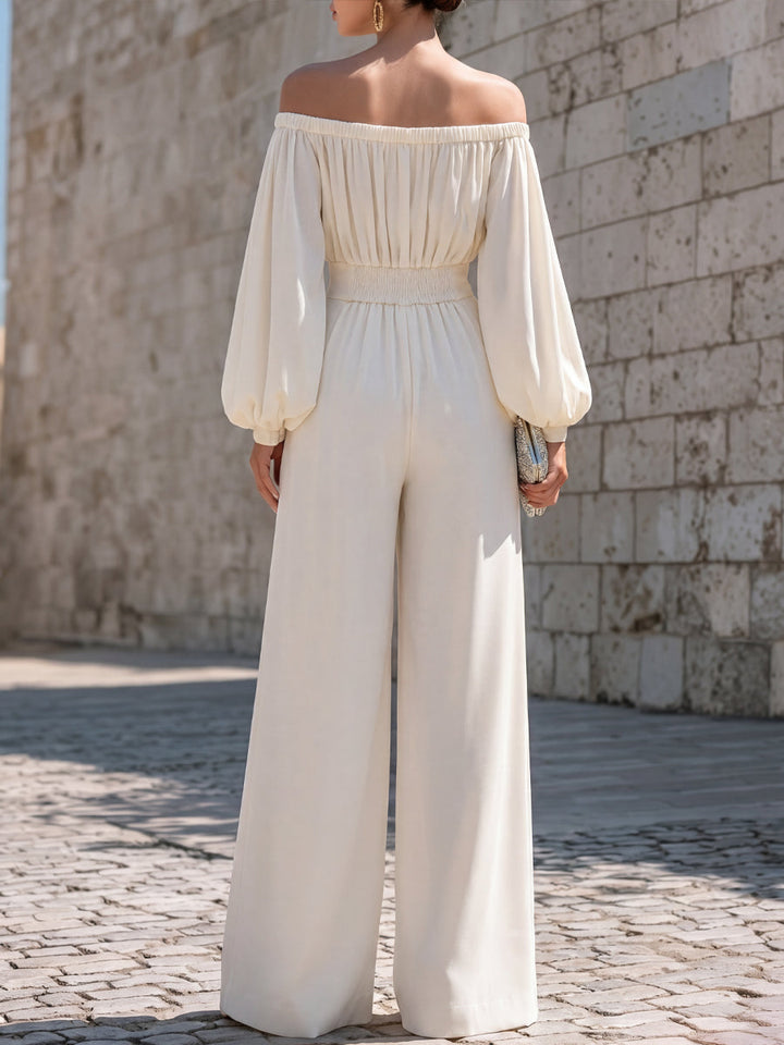 White off-shoulder maxi dress, elegant for a summer party, wedding guest, or formal event.