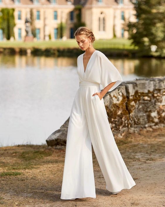 Women's elegant wide leg evening jumpsuit for formal parties & special occasions. Chic and comfortable.