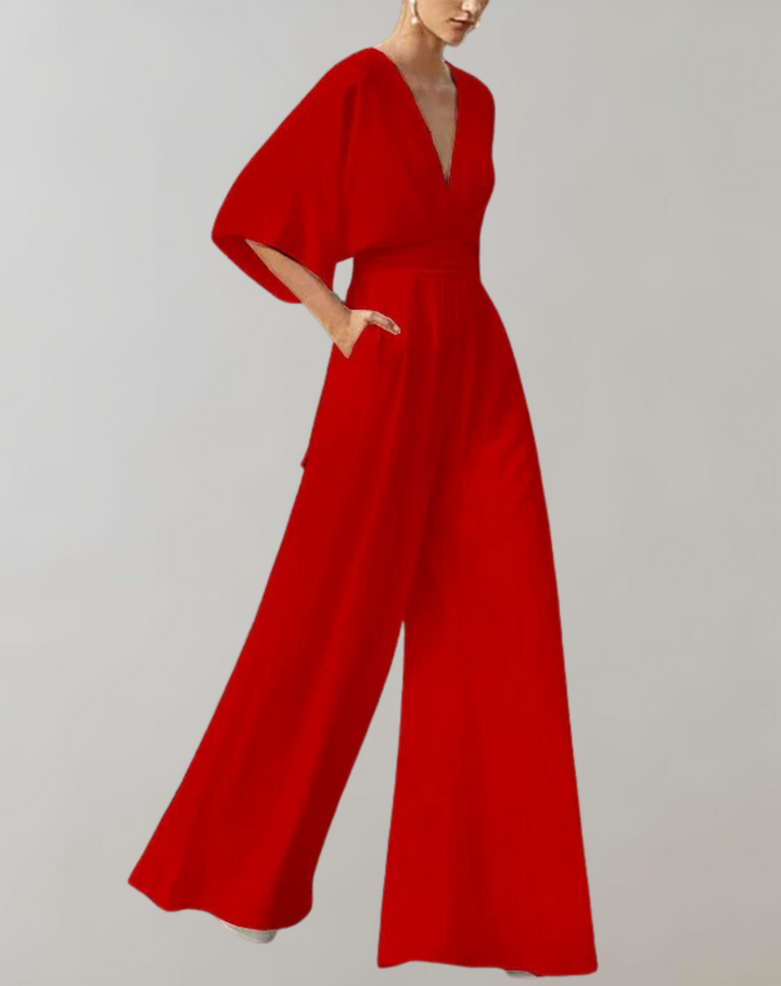 Formal women's wide leg jumpsuit, perfect for evening wear. Button front detail adds chic style.
