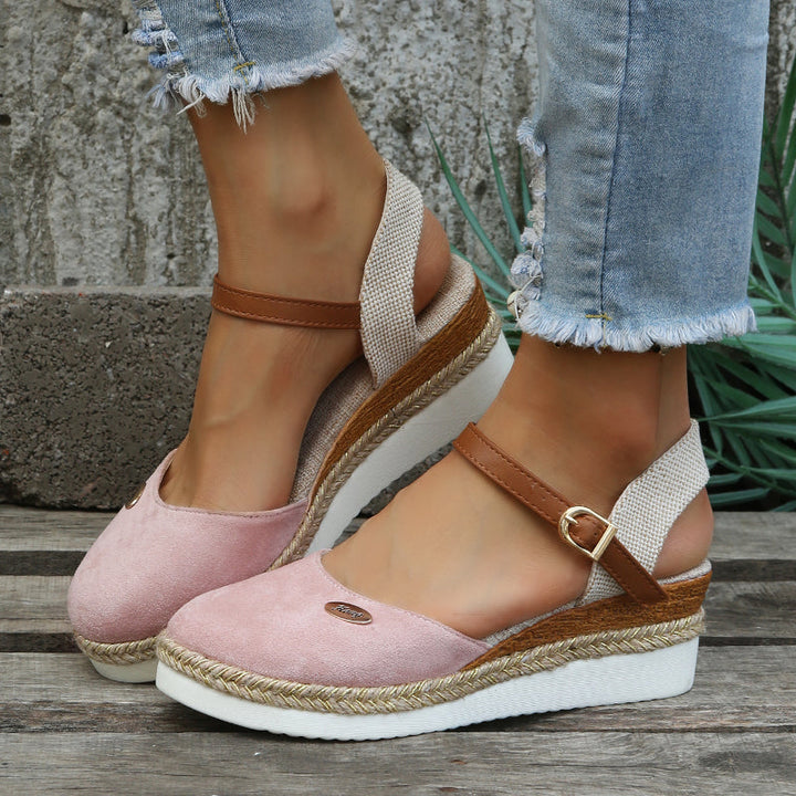 Elegant women's cushioned sandals for summer. Woven design offers comfortable style for casual or beachwear.