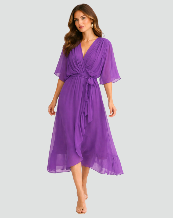 Sophisticated women's midi wrap dress with v-neck, a flattering tie waist, and flowing silhouette.