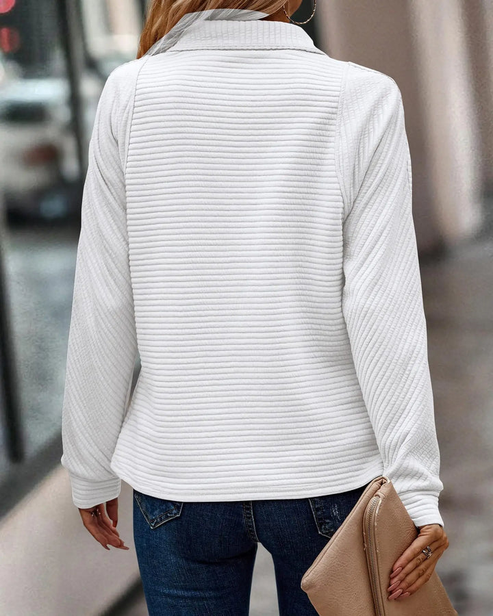 Women's comfortable V-neck sweater with zipper, a versatile and stylish knit top.