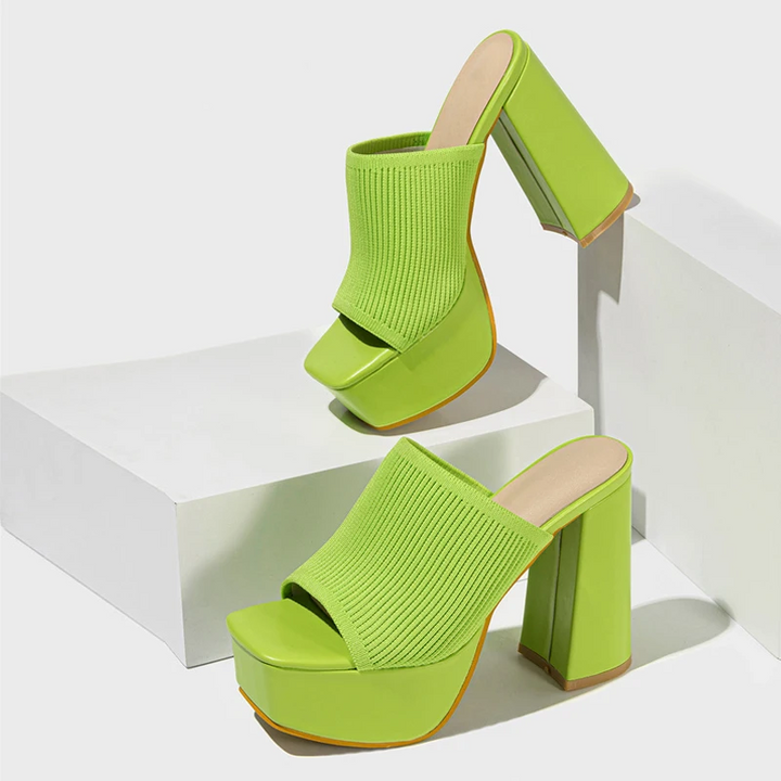 Modern women's platform sandals featuring an open toe and comfortable elevated sole.