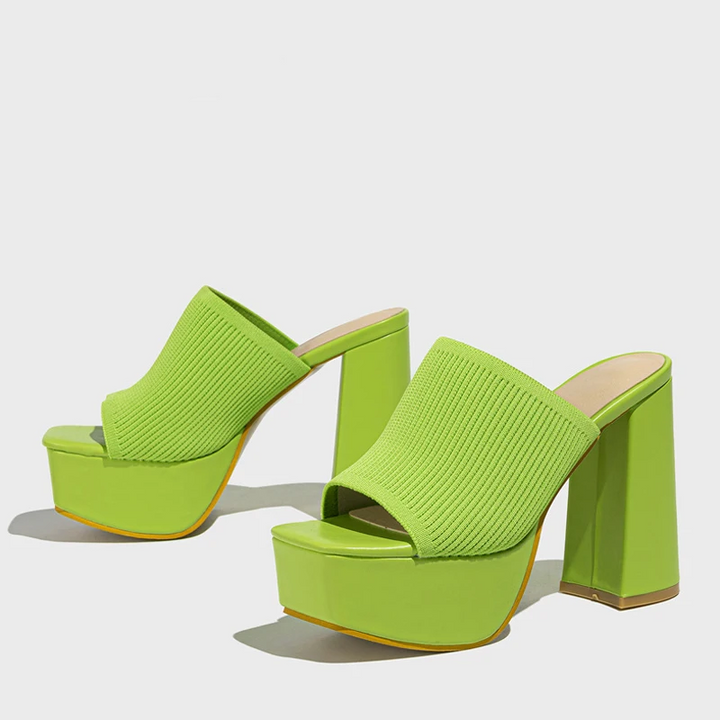 Elevated platform sandals for women, stylish and comfortable summer footwear with a modern design.