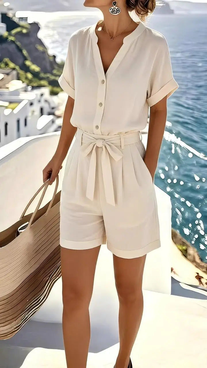 Women's Elowen tie-front romper in a solid color, perfect for casual summer wear or a vacation outfit.