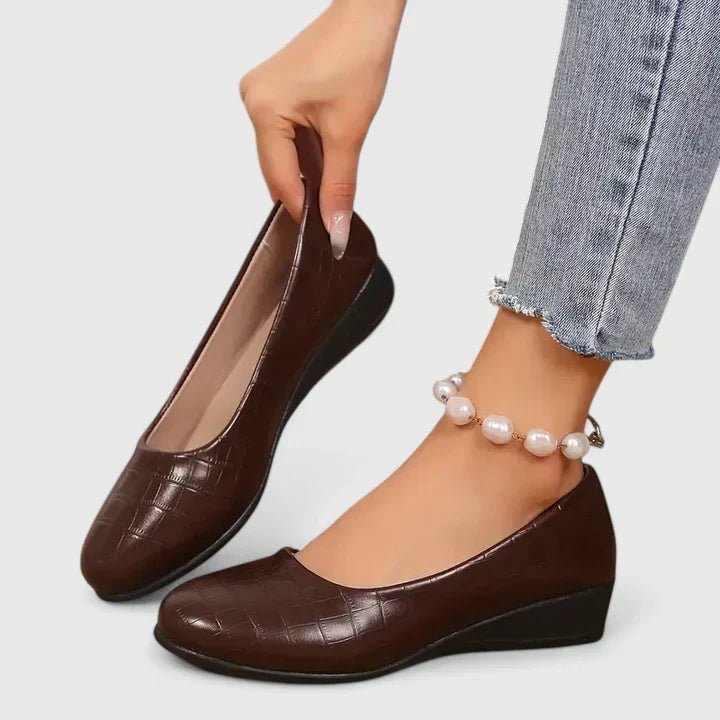 Women's embossed square toe wedge loafers. Comfortable slip-on with subtle lift, ideal for elegant office & casual wear.