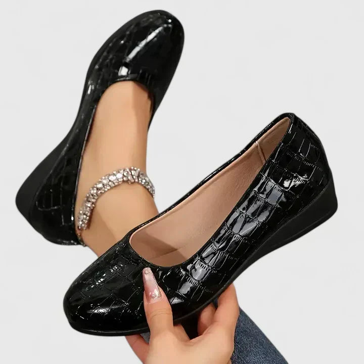 Comfortable women's slip-on wedge loafers. Embossed texture, square toe design for versatile, dressy footwear.